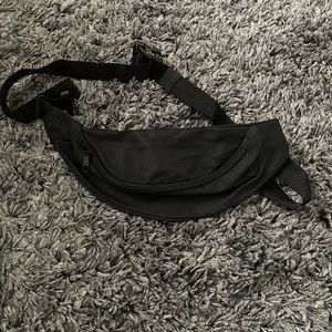 black party city fanny pack